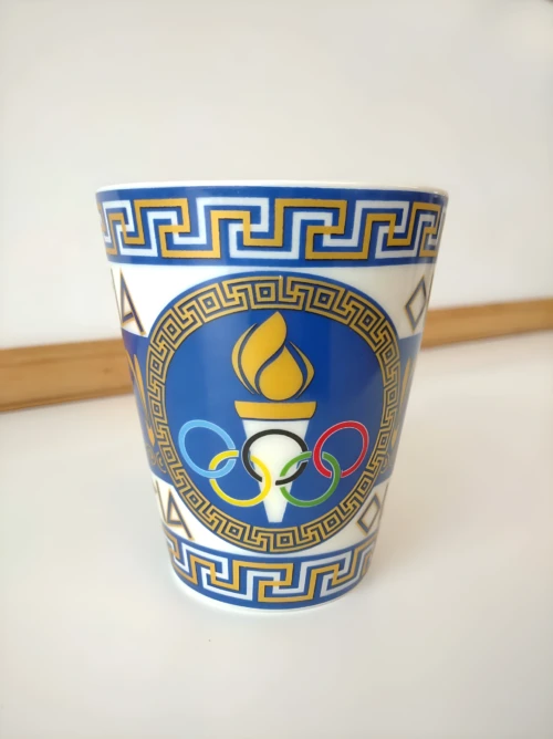 459957fa 58ce 4d1f 9a1c 0795deea56da 2026 02 09 10 41 29.858277.jpg scaled Κούπα λευκή-μπλέ γυαλιστερή-Ολυμπιακή Φλόγα